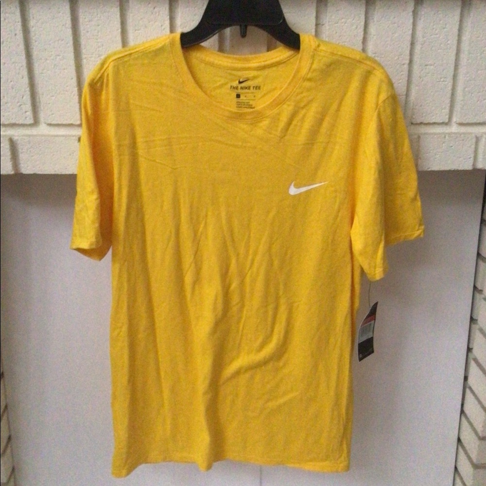 Nike Men’s Athletic Cut Size Large Yellow with white swoosh.